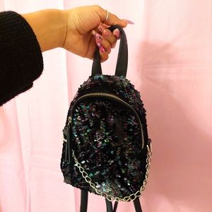 GROOVE [ Sequin mini-backpack ]
